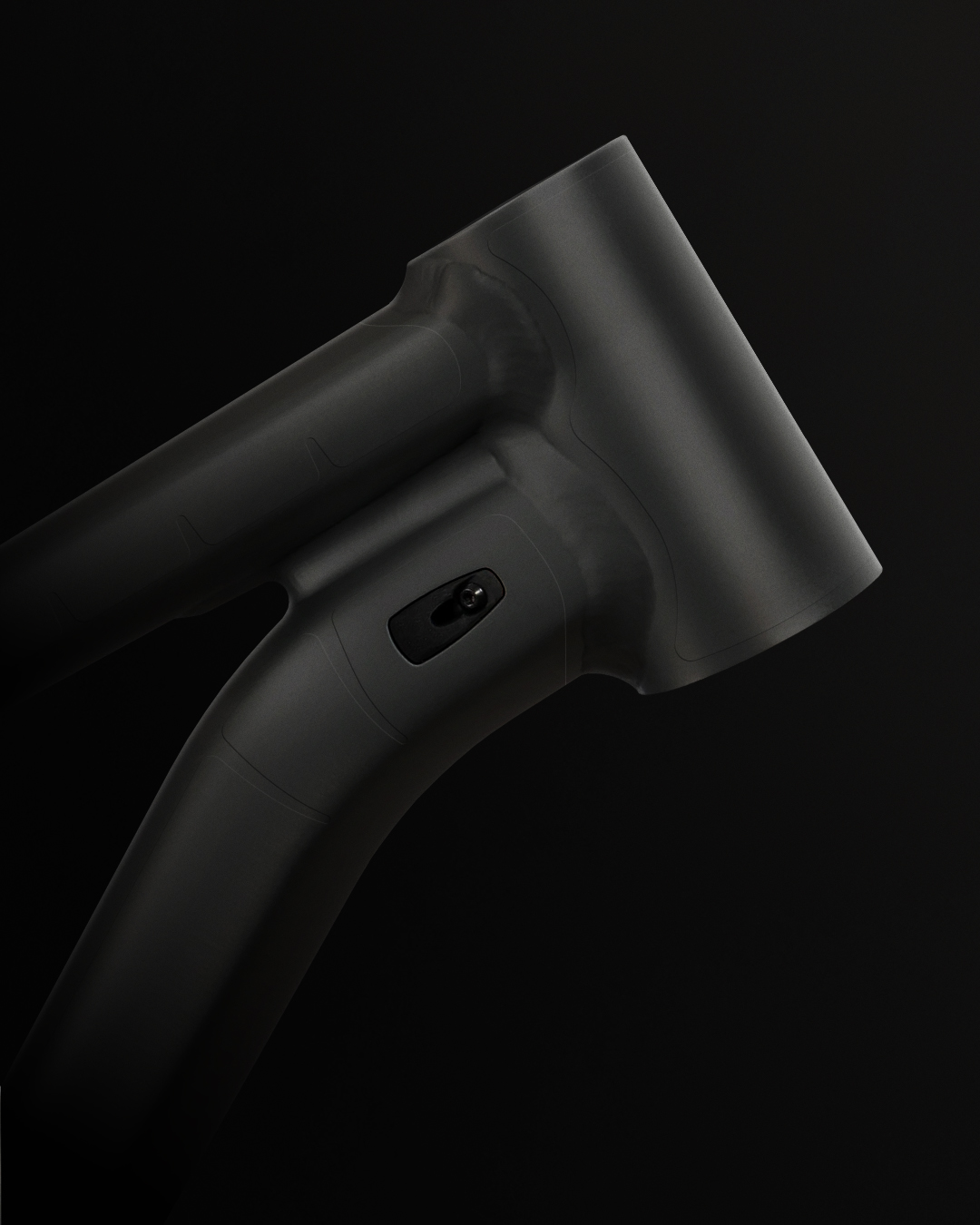 Translucent paint protective film on matte black mountain bike frame headtube.
