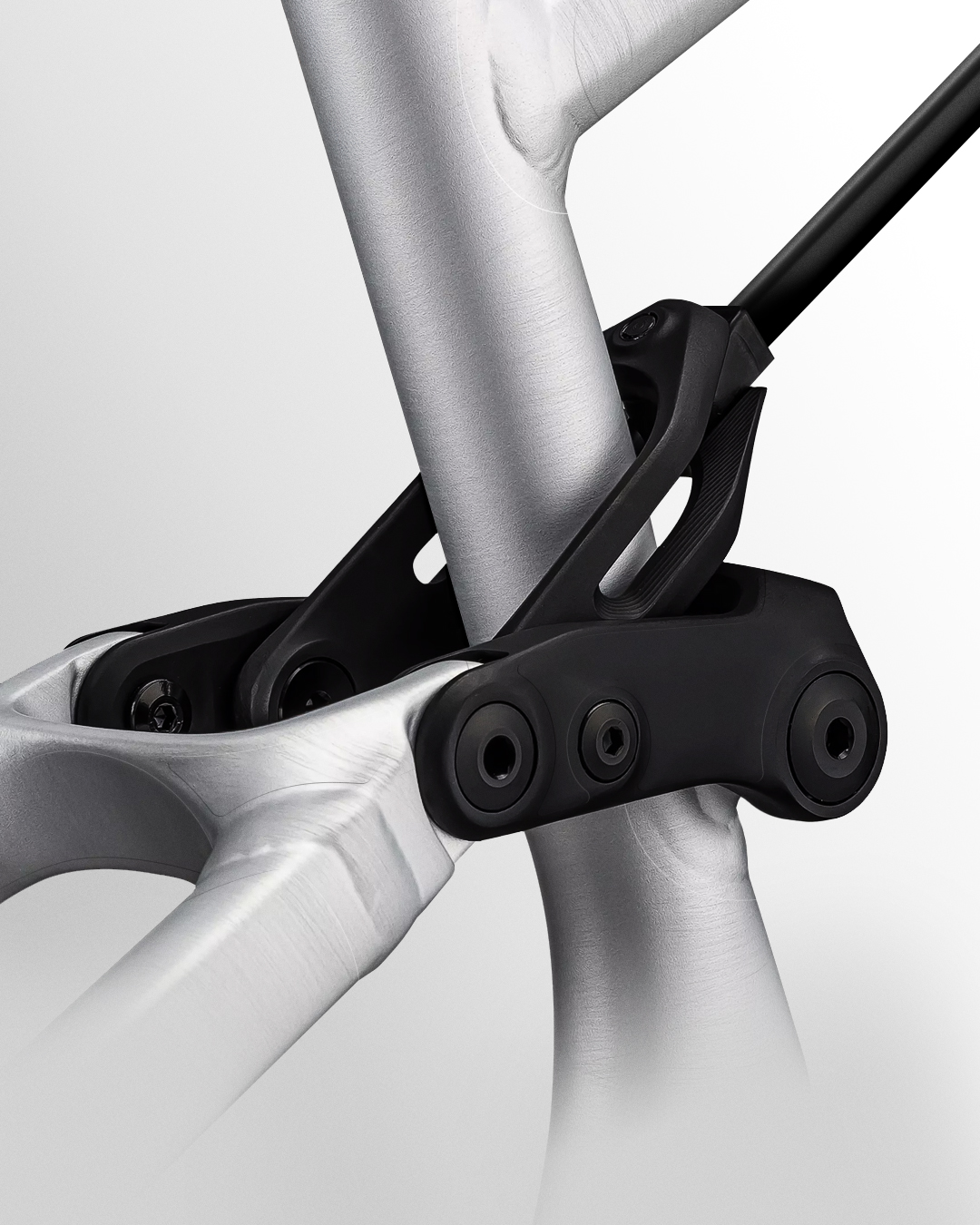 Translucent paint protective film on a mountain bikes suspension pivots.